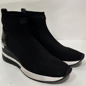 Michael Kors Black Wedge Sock Sneakers.